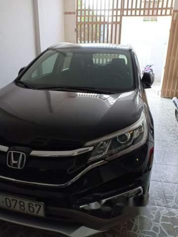 Cần bán lại xe Honda CR V AT đời 2015, màu đen, xe còn mới, chính chủ, giấy tờ đầy đủ