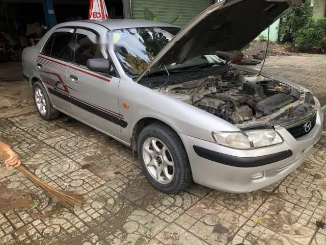 Cần bán xe Mazda 626 sản xuất năm 2001, màu bạc xe gia đình