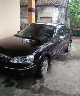 Cần bán gấp Ford Laser Ghia 1.8 MT năm 2003, màu đen, giá tốt 