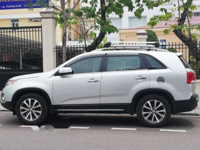 Gia đình cần tiền bán Kia Sorento GATH đời 2013, màu bạc