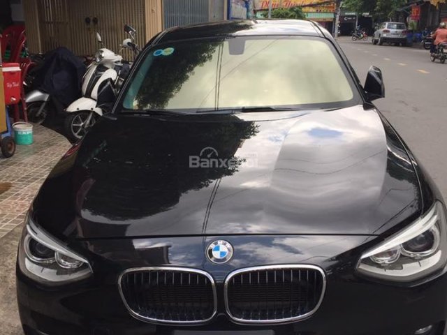 Bán em BMW 116i đời 2013 màu đen, số tự động, 8 cấp