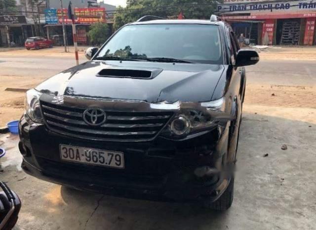 Chính chủ bán xe Toyota Fortuner MT đời 2013, màu đen