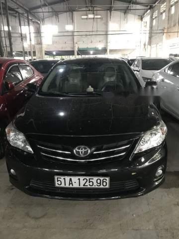 Cần bán lại xe Toyota Corolla Altis sản xuất 2011, màu đen