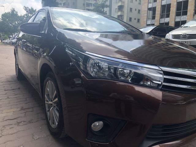 Bán xe Toyota Corolla Altis 1.8G năm 2014, màu nâu, giá chỉ 660 triệu