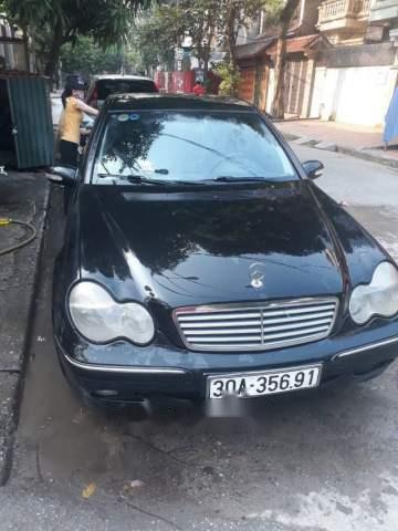 Bán xe Mercedes C200 đời 2002, màu đen số tự động, giá 210tr