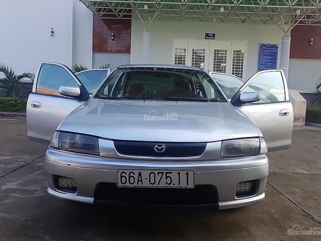 Cần bán lại xe Mazda 323 2001, màu bạc giá cạnh tranh