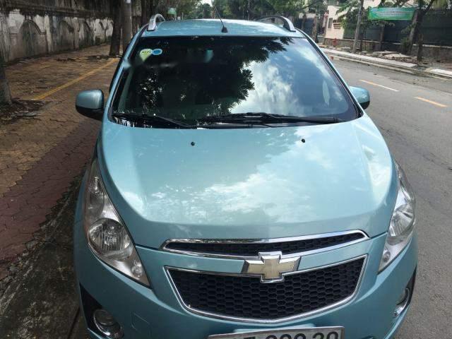 Gia đình bán xe Chevrolet Spark LT đời 2012, màu xanh