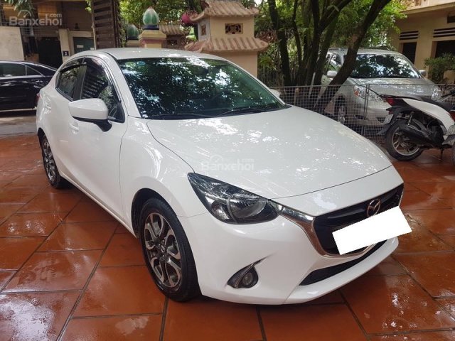 Bán xe Mazda 2 sx 2016 số tự động, màu trắng, zin