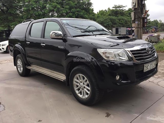 Cần bán gấp Toyota Hilux MT đời 2014, màu đen, xe nhập còn mới