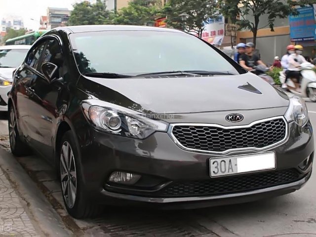 Cần bán lại xe Kia K3 1.6 MT năm 2015, màu nâu