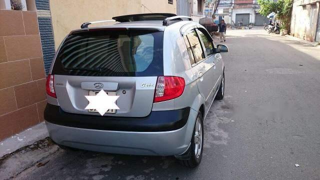 Cần bán xe Hyundai Getz 1.4AT sản xuất năm 2009, màu bạc xe gia đình