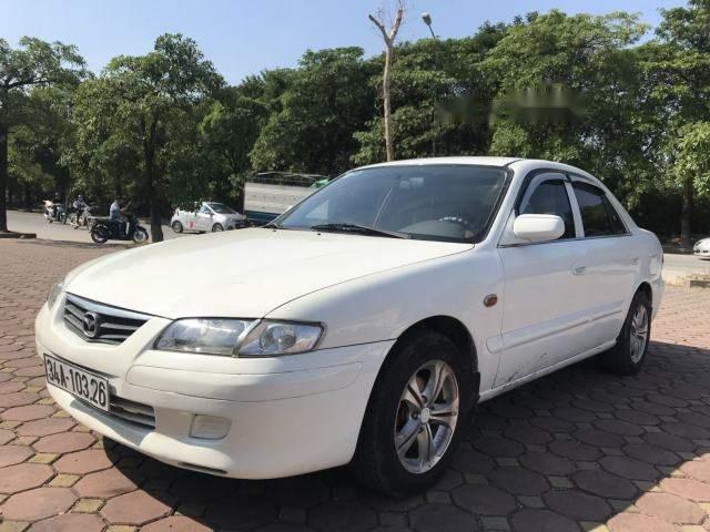 Cần bán xe Mazda 626 sản xuất năm 2001, màu trắng xe gia đình, 125tr