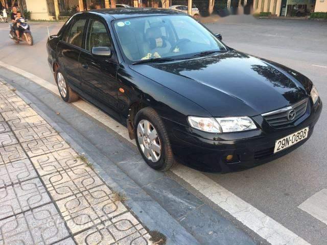 Cần bán Mazda 626 đời 2001, màu đen xe gia đình