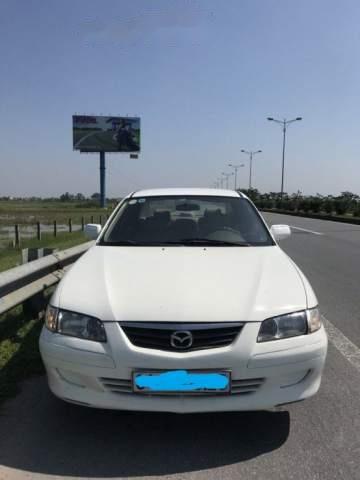 Cần bán xe Mazda 626 đời 2001, màu trắng, giá 138tr0