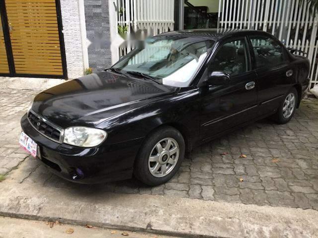 Cần bán gấp Kia Spectra sản xuất năm 2005, màu đen, nhập khẩu