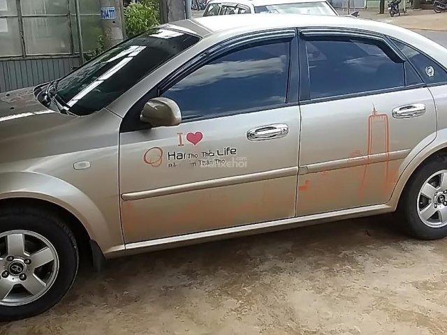 Gia đình bán Daewoo Lacetti EX đời 2011, màu vàng