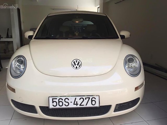 Bán Volkswagen New Beetle 1.6 AT sản xuất năm 2010, màu kem (be), xe nhập, giá 600tr