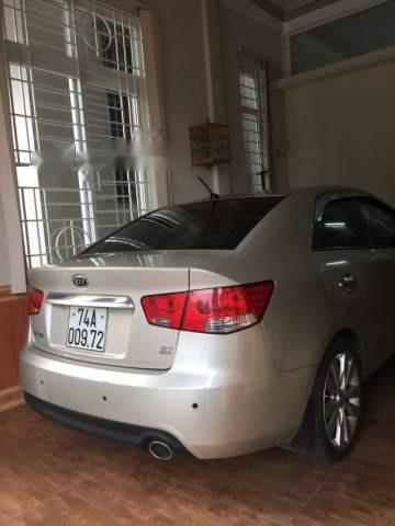 Bán xe Kia Forte SX MT sản xuất năm 2012, màu vàng cát0