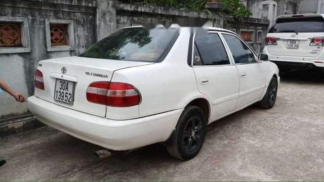 Gia đình bán Toyota Corolla altis 1999, màu trắng 