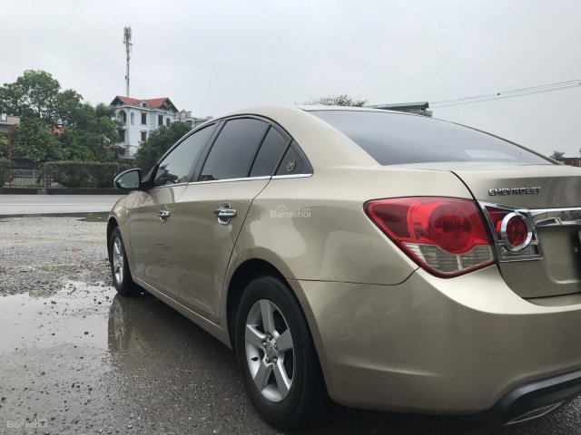 Bán xe Chevrolet Cruze 2010, màu vàng cát