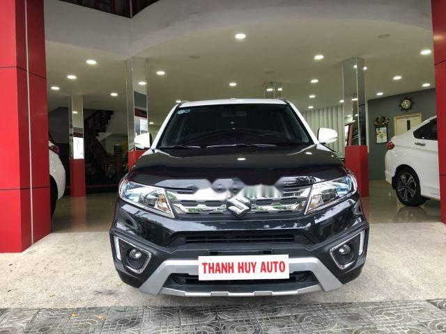 Cần bán Suzuki Vitara 1.6AT sản xuất 2015, màu đen, nhập khẩu xe gia đình