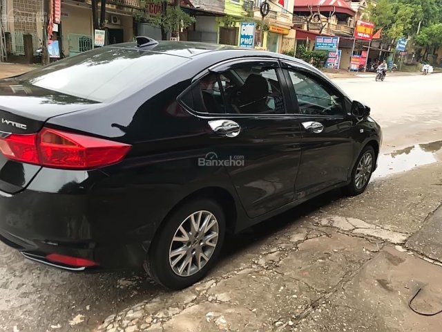 Cần bán Honda City đời 2015, màu đen số sàn0