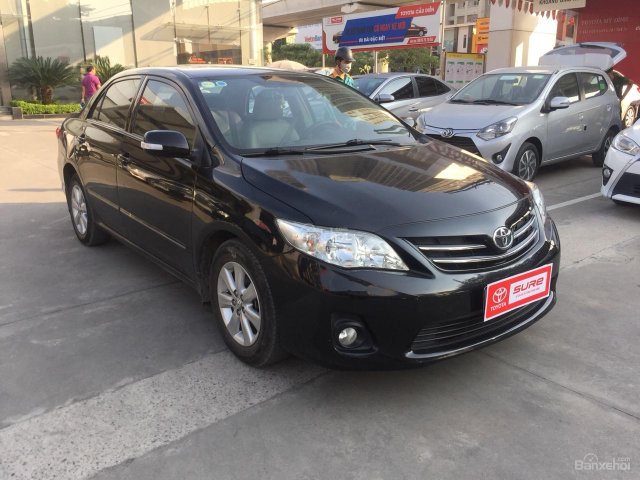 Cần bán Toyota Corolla altis 1.8AT đời 2014, màu đen