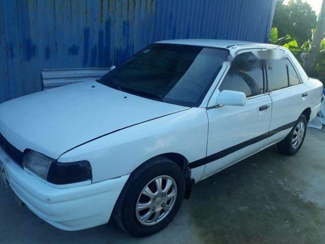 Cần bán xe Mazda 323 sản xuất năm 1996, màu trắng