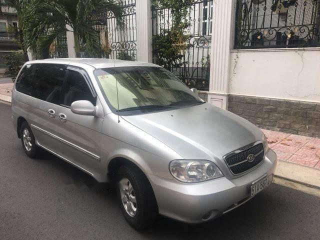 Bán Kia Carnival đời 2009, màu bạc xe gia đình