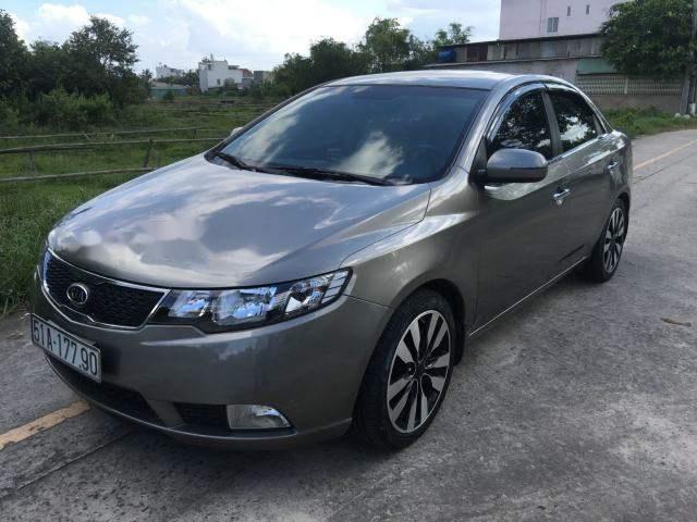 Cần bán lại xe Kia Forte 2011, màu xám