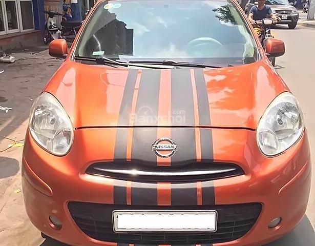 Cần bán lại xe Nissan Micra đời 2010, màu vàng cam, xe nhập số tự động0