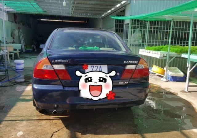 Cần bán Mitsubishi Lancer đời 2001, màu xanh