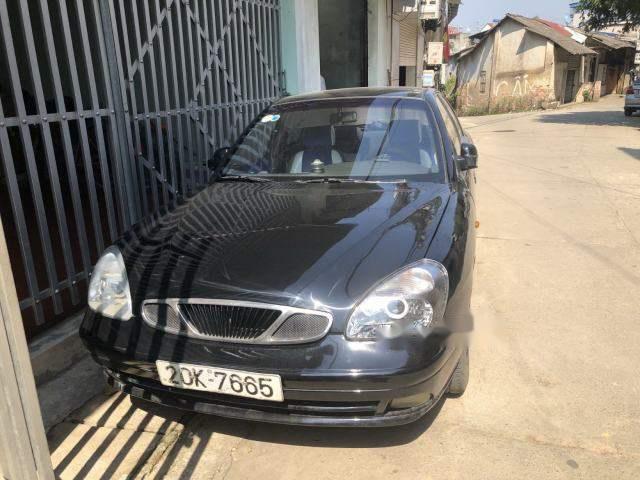 Cần bán Daewoo Nubira 1.6 MT 2002, màu đen, 88tr