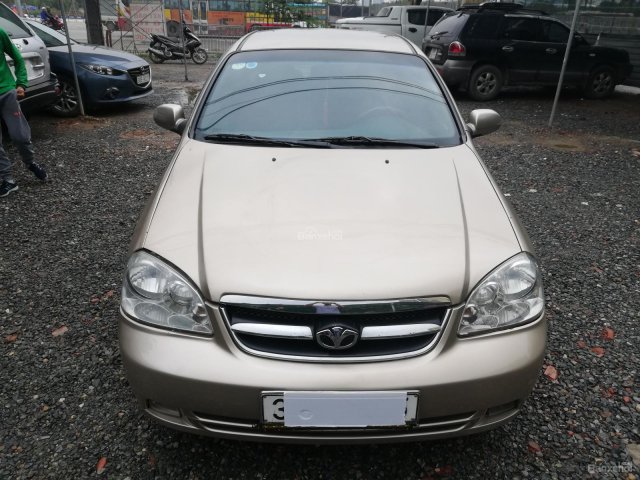 Xe Daewoo Lacetti EX đăng ký lần đầu 2010, màu vàng xe gia đình, giá 205 triệu