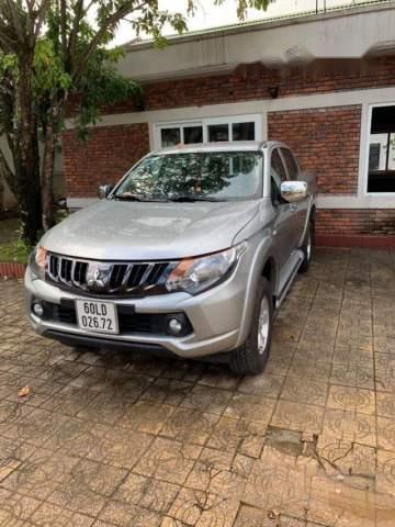 Cần bán lại xe Mitsubishi Triton MT đời 2018, xe mới sử dụng đăng kí 8/2018, chạy 2000km