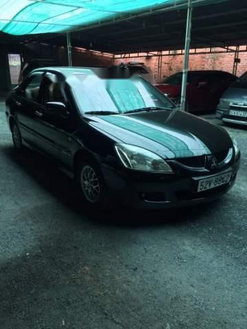 Cần bán Mitsubishi Lancer 2004, màu đen, xe nhập