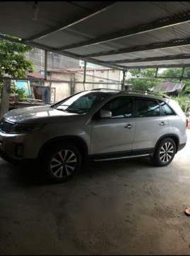 Cần bán lại xe Kia Sorento đời 2014, màu bạc