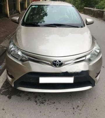 Gia đình bán Toyota Vios E đời 2014, màu vàng cát