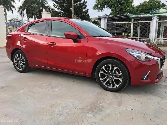 Bán Mazda 2 1.5 AT năm 2016, màu đỏ, xe gia đình