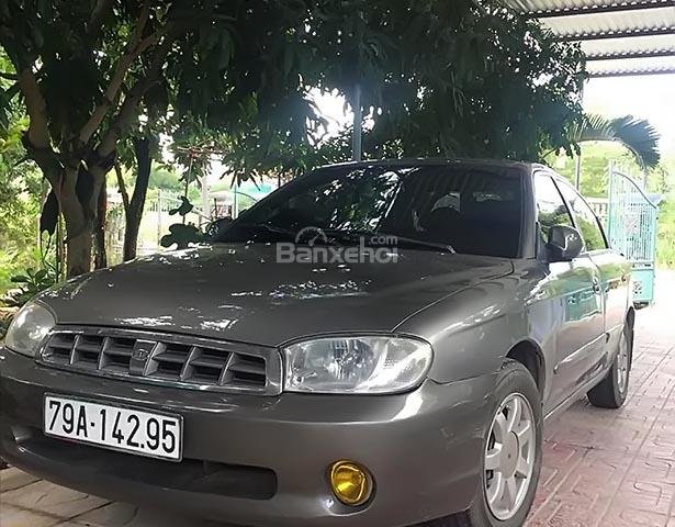 Cần bán gấp Kia Spectra 1.6 MT đời 2005, màu xám, xe bảo dưỡng tuyệt đối