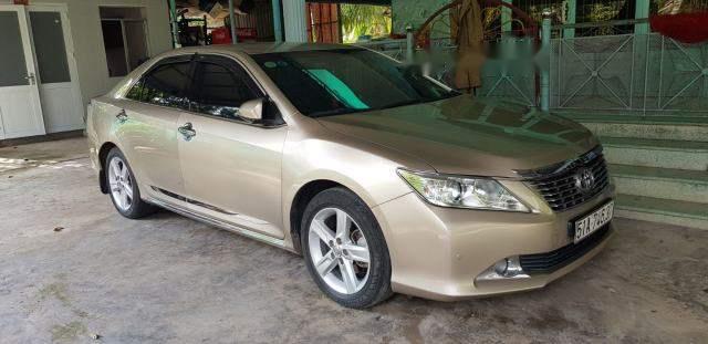 Cần bán Toyota Camry 2.5Q đời 2013, màu vàng chính chủ