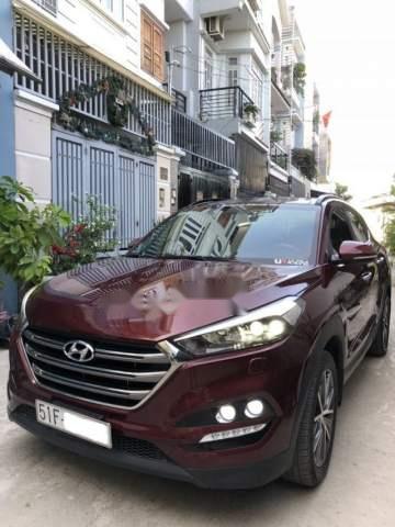 Cần bán Hyundai Tucson AT sản xuất 2015, màu đỏ, xe còn rất mới