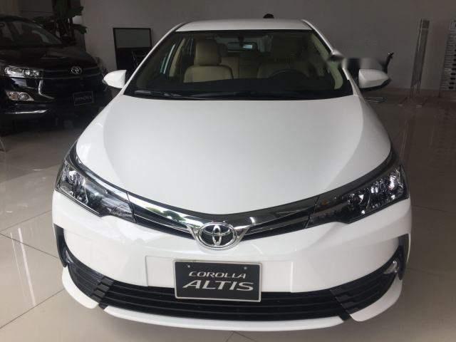 Bán ô tô Toyota Corolla altis 1.8E đời 2018, màu trắng, 718tr