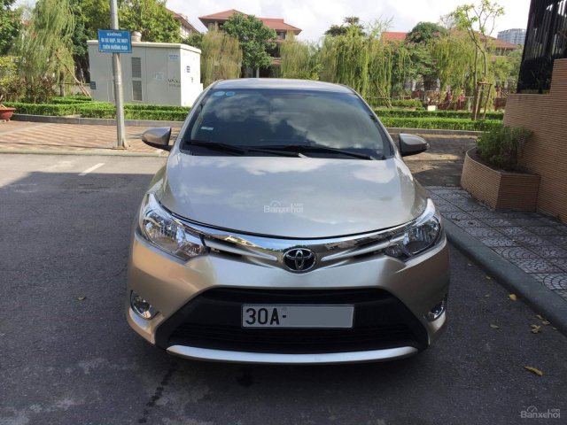 Gia đình cần bán Toyota Vios sản xuất 2014, số sàn, màu vàng cát, chính chủ