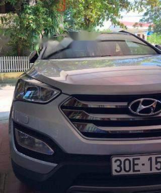 Bán ô tô Hyundai Santa Fe 2.4 AT đời 2014, màu bạc