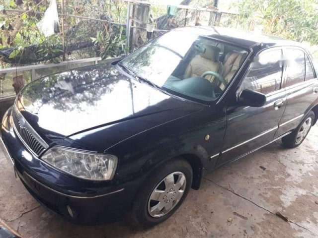 Bán xe Ford Laser 1.6 sản xuất 2002, màu đen, giá chỉ 180 triệu