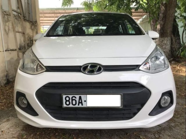 Gia đình bán Hyundai Grand i10 2014, màu trắng, nhập khẩu0