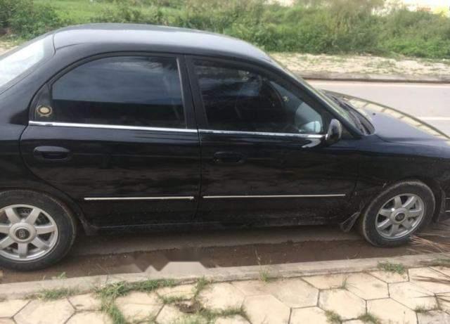 Bán xe Kia Spectra đời 2003, màu đen