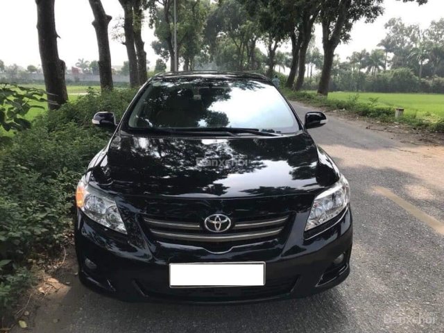 Cần bán gấp Toyota Altis 2009 số sàn, màu đen