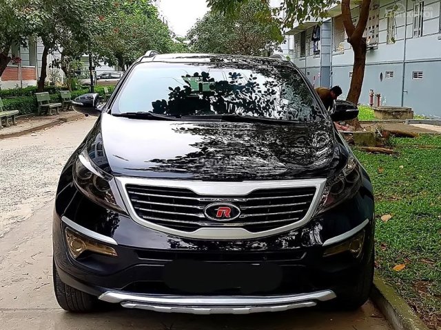 Cần bán Kia Sportage TLX 2.0 AT đời 2010, màu đen, nhập khẩu nguyên chiếc còn mới, giá tốt